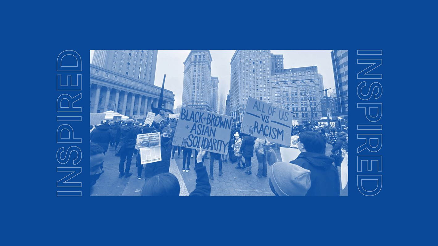 Inspired image of people protesting with stop hate signs